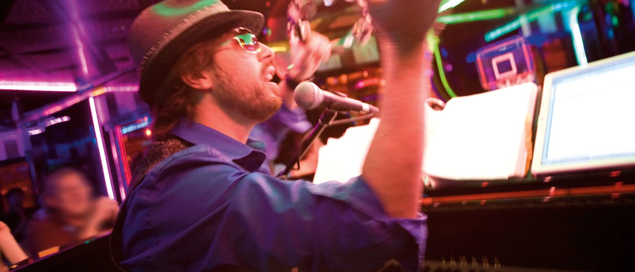 The atmosphere is high in the piano bar