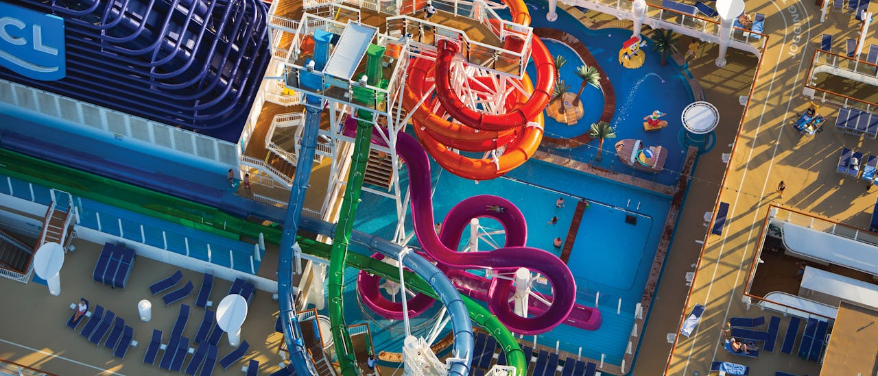 3 water slides over the pool deck